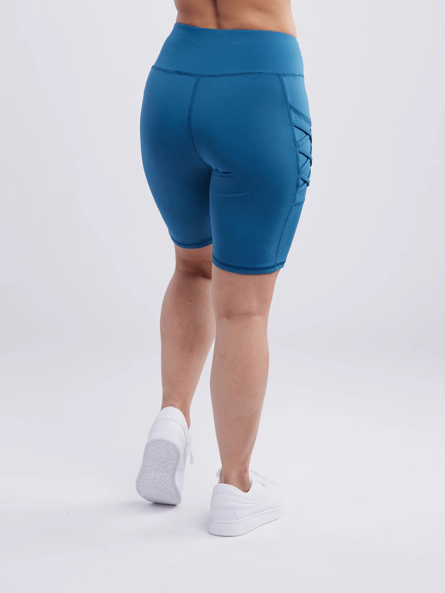 high waisted workout shorts with pockets and criss cross design