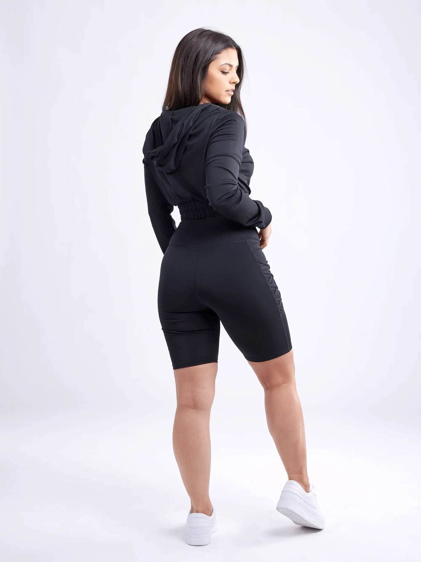 high waisted workout shorts with pockets and criss cross design