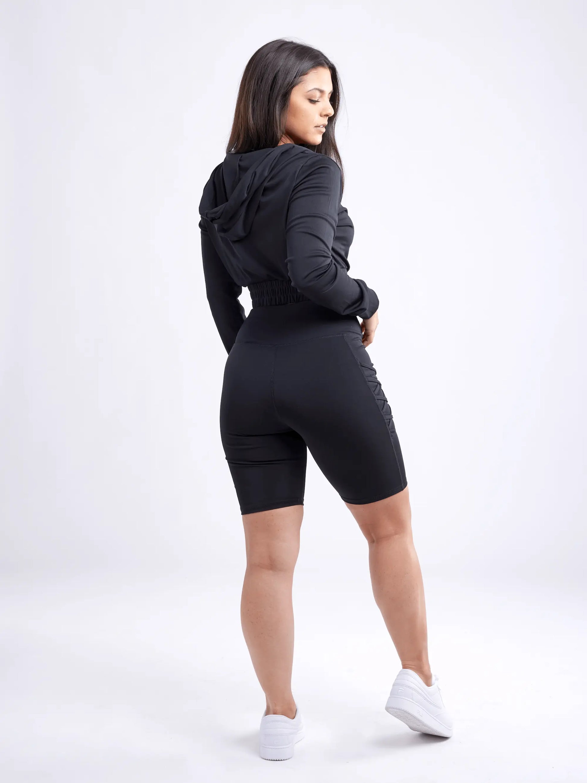 high waisted workout shorts with pockets and criss cross design