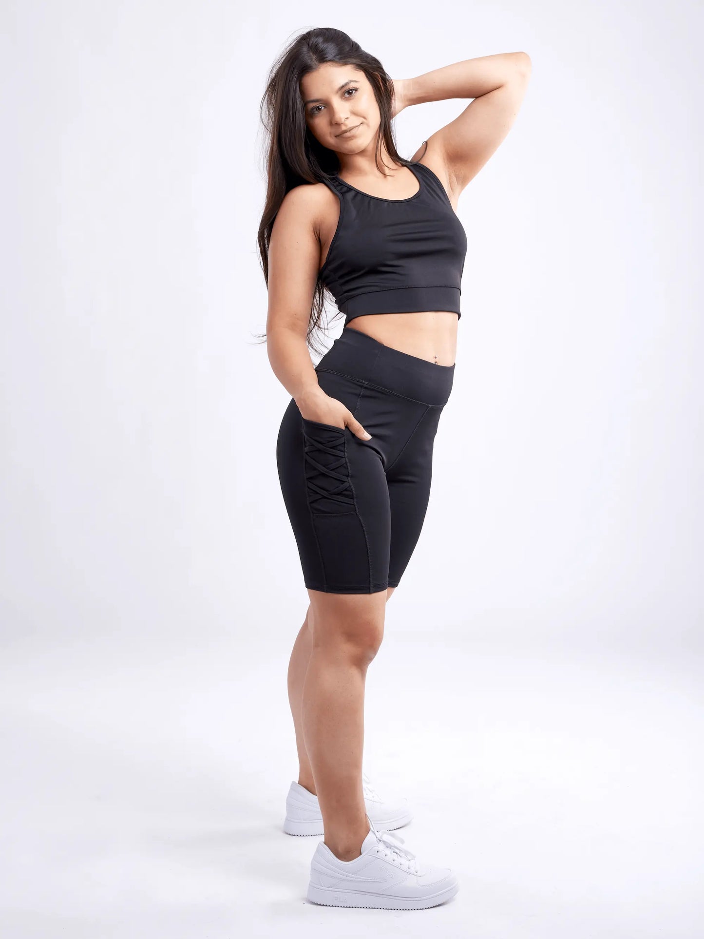 high waisted workout shorts with pockets and criss cross design